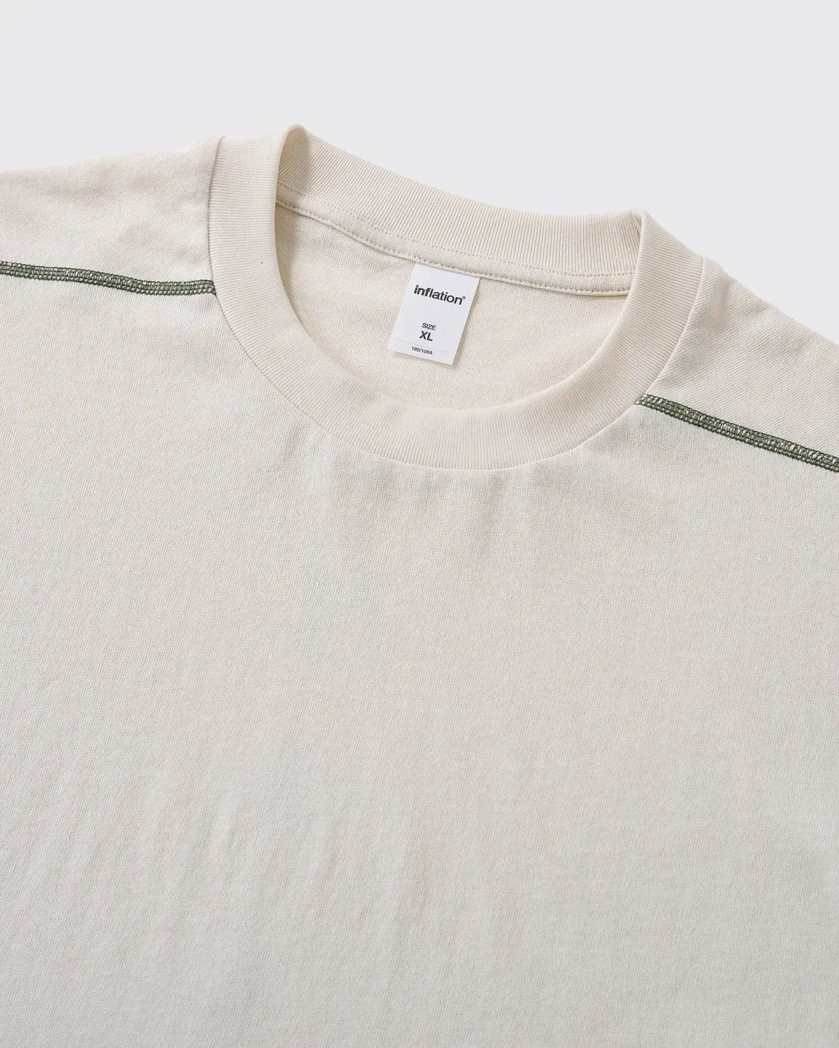 Apricot Flation breathable activewear long sleeve tee, stylish streetwear top designed for comfort and performance.