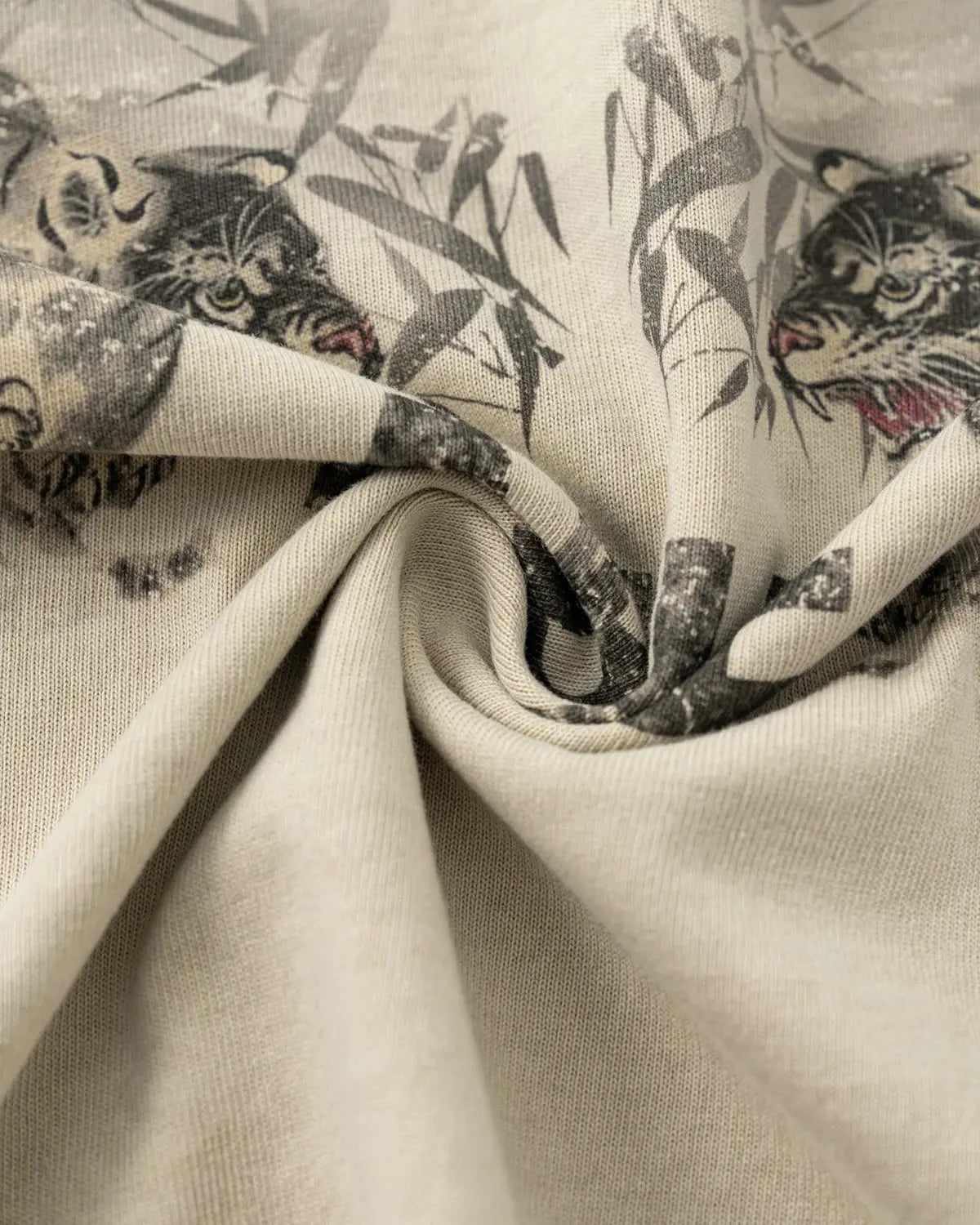 Flation oversized vintage washed graphic T-shirt in apricot color featuring streetwear style and bold design.