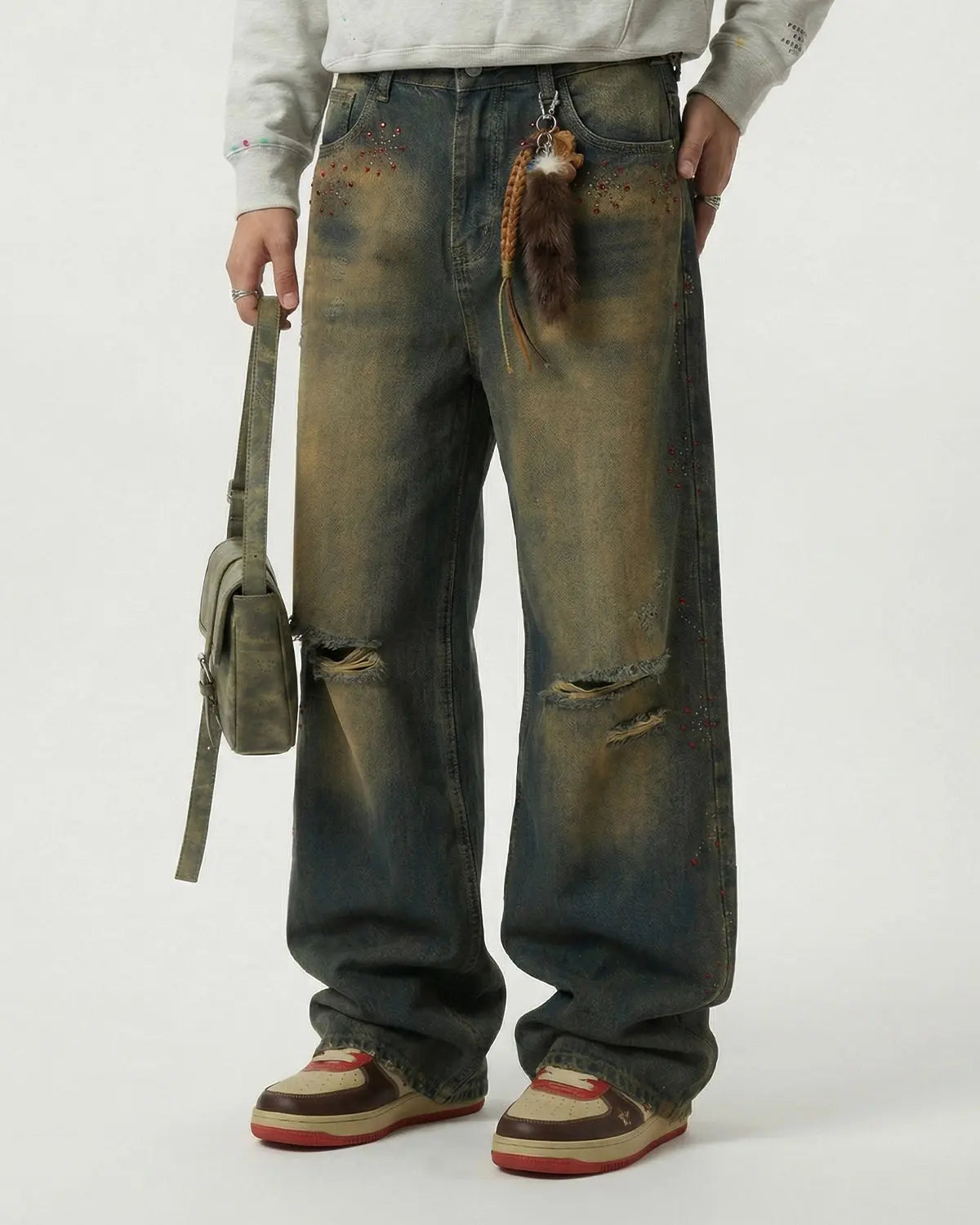 Flation Dirty Wash Rhinestone Baggy Jeans featuring distressed denim and rhinestone accents, streetwear style, relaxed fit.