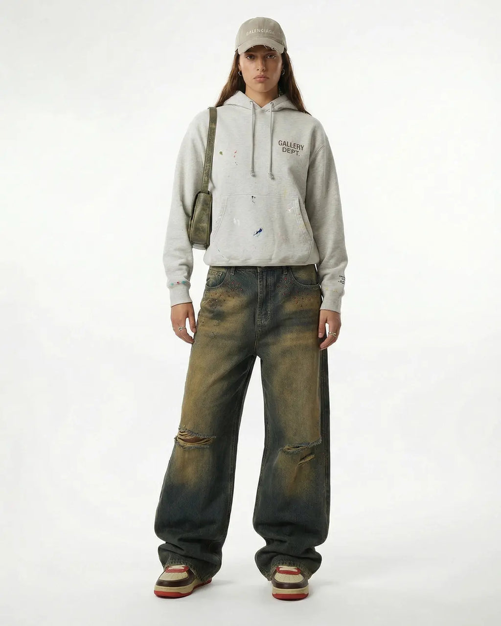 Flation Dirty Wash Rhinestone Baggy Jeans featuring distressed denim, rhinestone accents, and a relaxed streetwear fit.