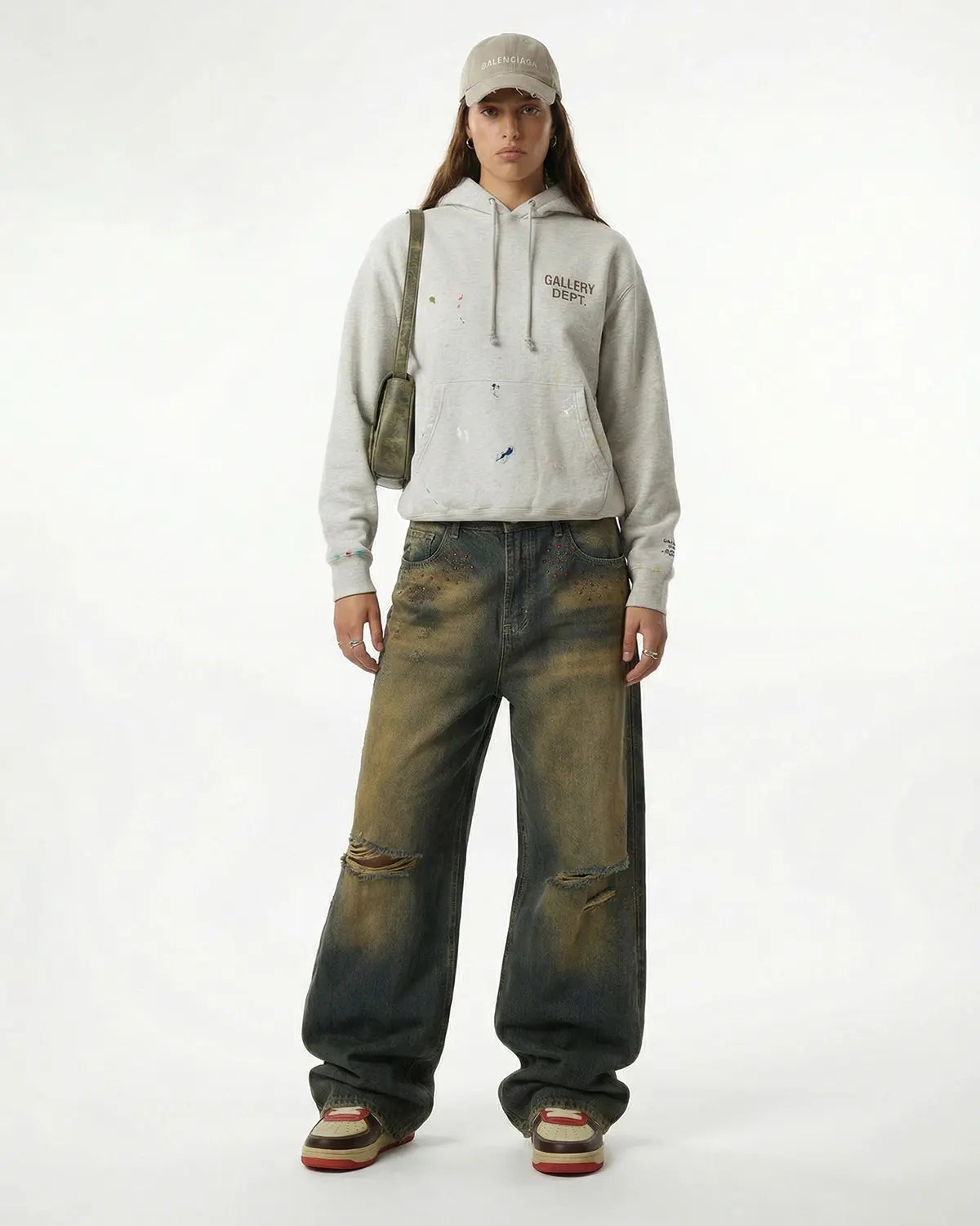 Flation Dirty Wash Rhinestone Baggy Jeans featuring distressed denim, rhinestone accents, and a relaxed streetwear fit.