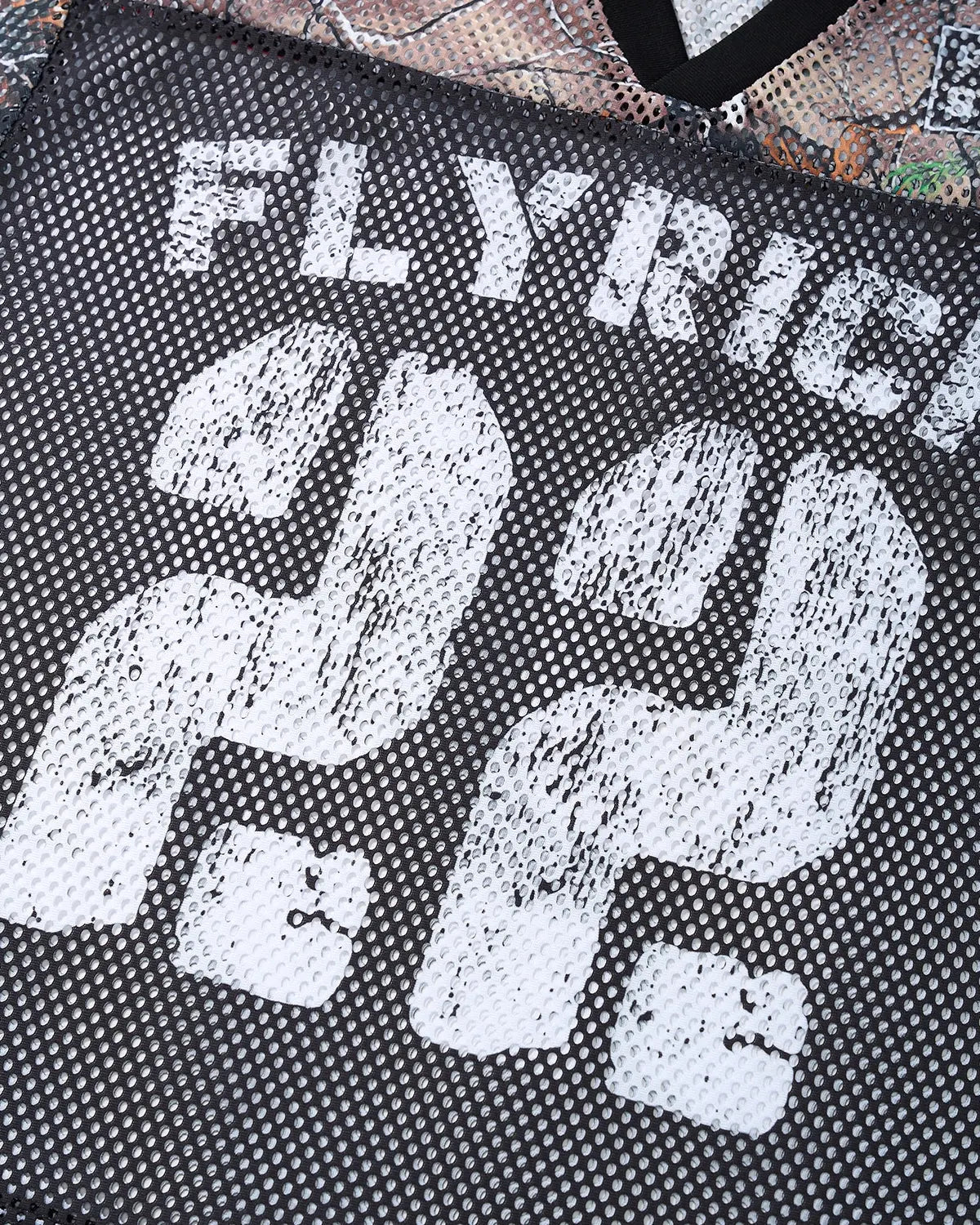 Camo mesh digital print jersey tee by Flation Streetwear featuring a camouflage pattern and lightweight fabric.
