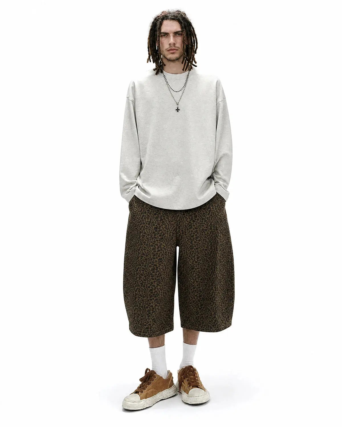 Leopard print barrel longline shorts by Flation Streetwear featuring bold animal pattern and relaxed fit.
