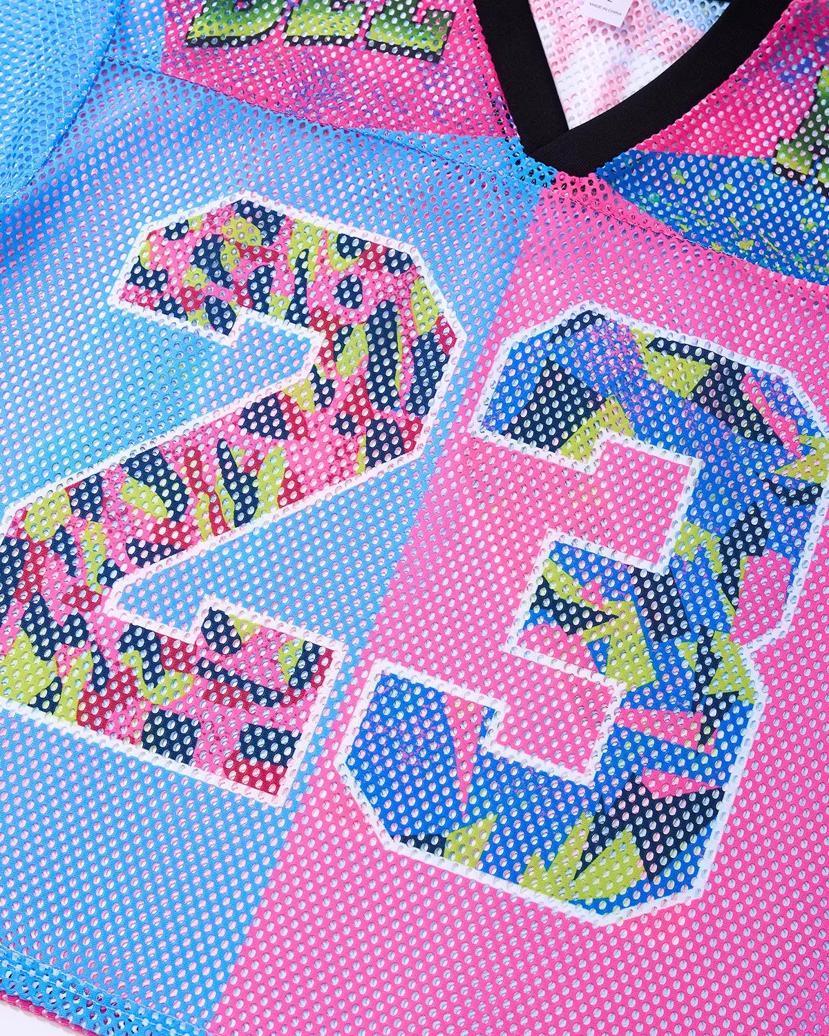 Flation Camo Graphic Mesh Jersey Tee featuring a camo print, mesh fabric, and streetwear style, shown on a model.