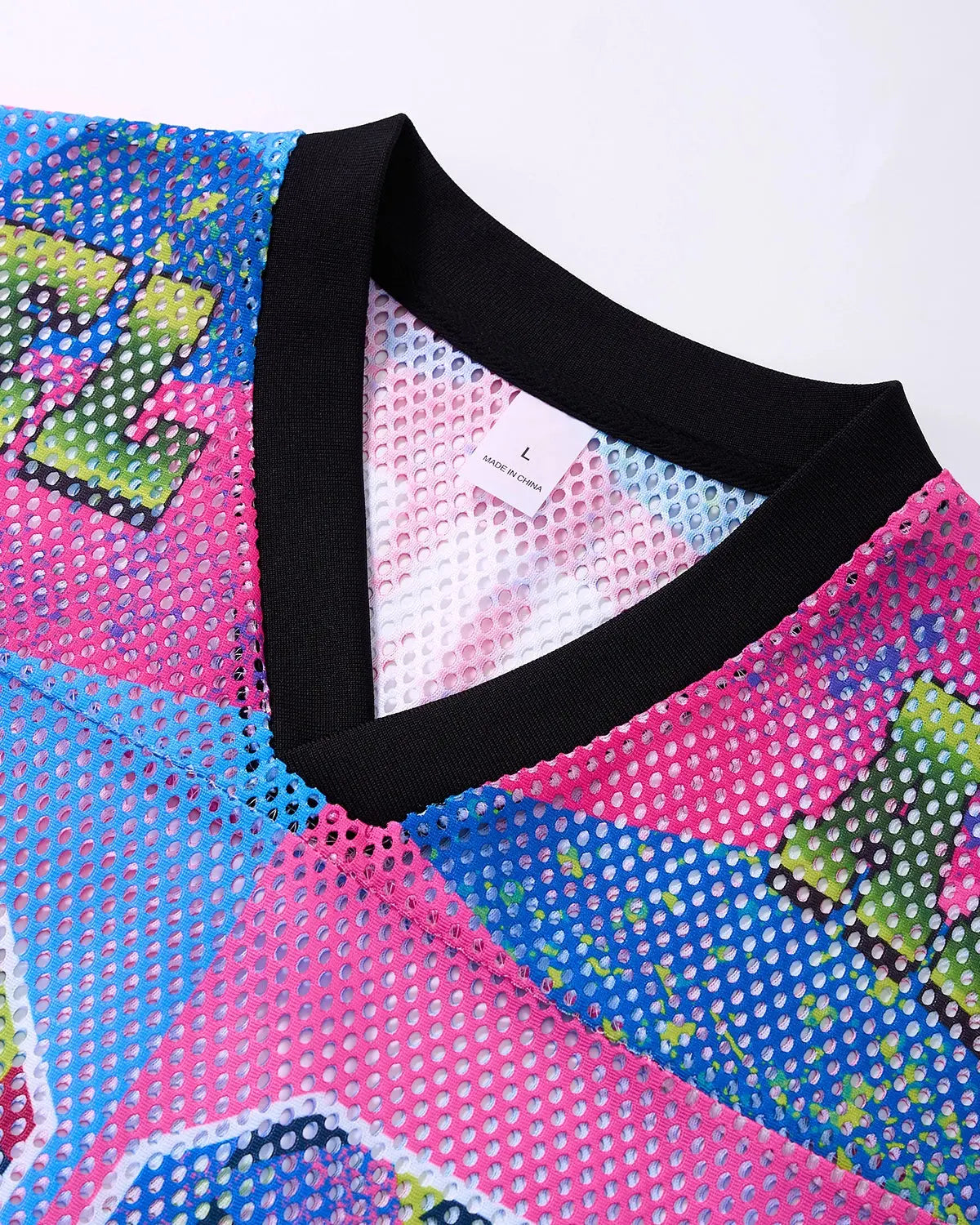 Camo graphic mesh jersey tee by Flation Streetwear featuring a camouflage pattern and breathable mesh fabric.