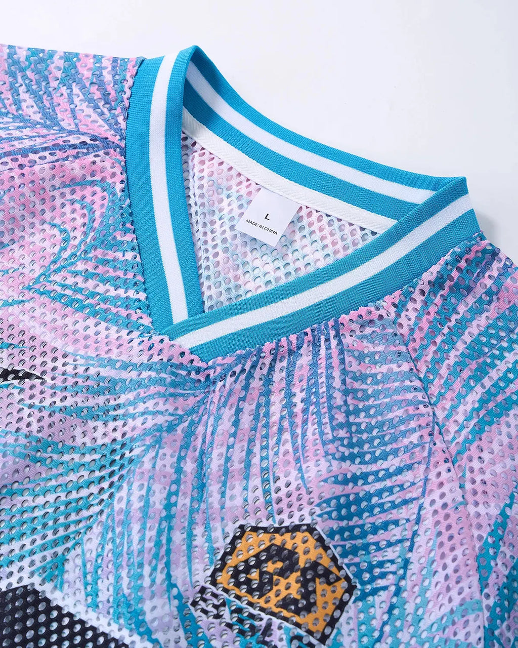 Oversized Flation Mesh Football Jersey with bold team logo and vibrant colors, streetwear style, breathable athletic fabric