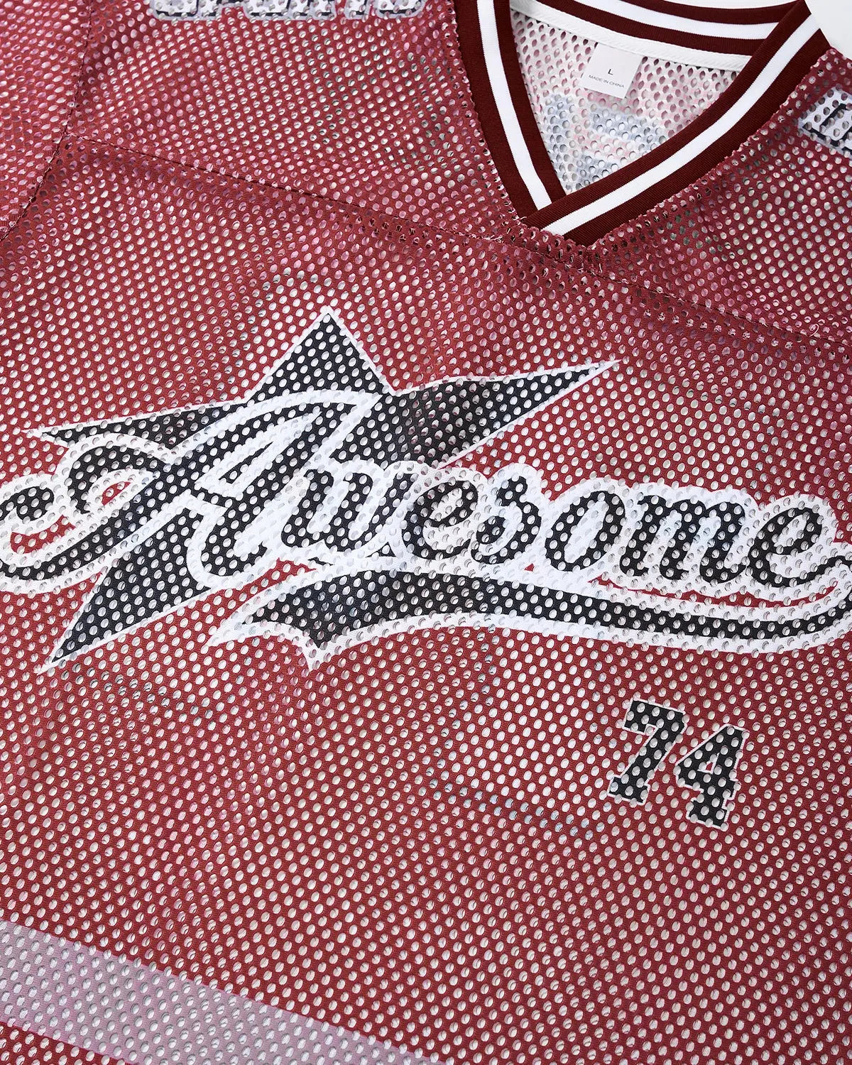 V-neck graphic mesh jersey by Flation Streetwear featuring bold graphic design and breathable mesh fabric.