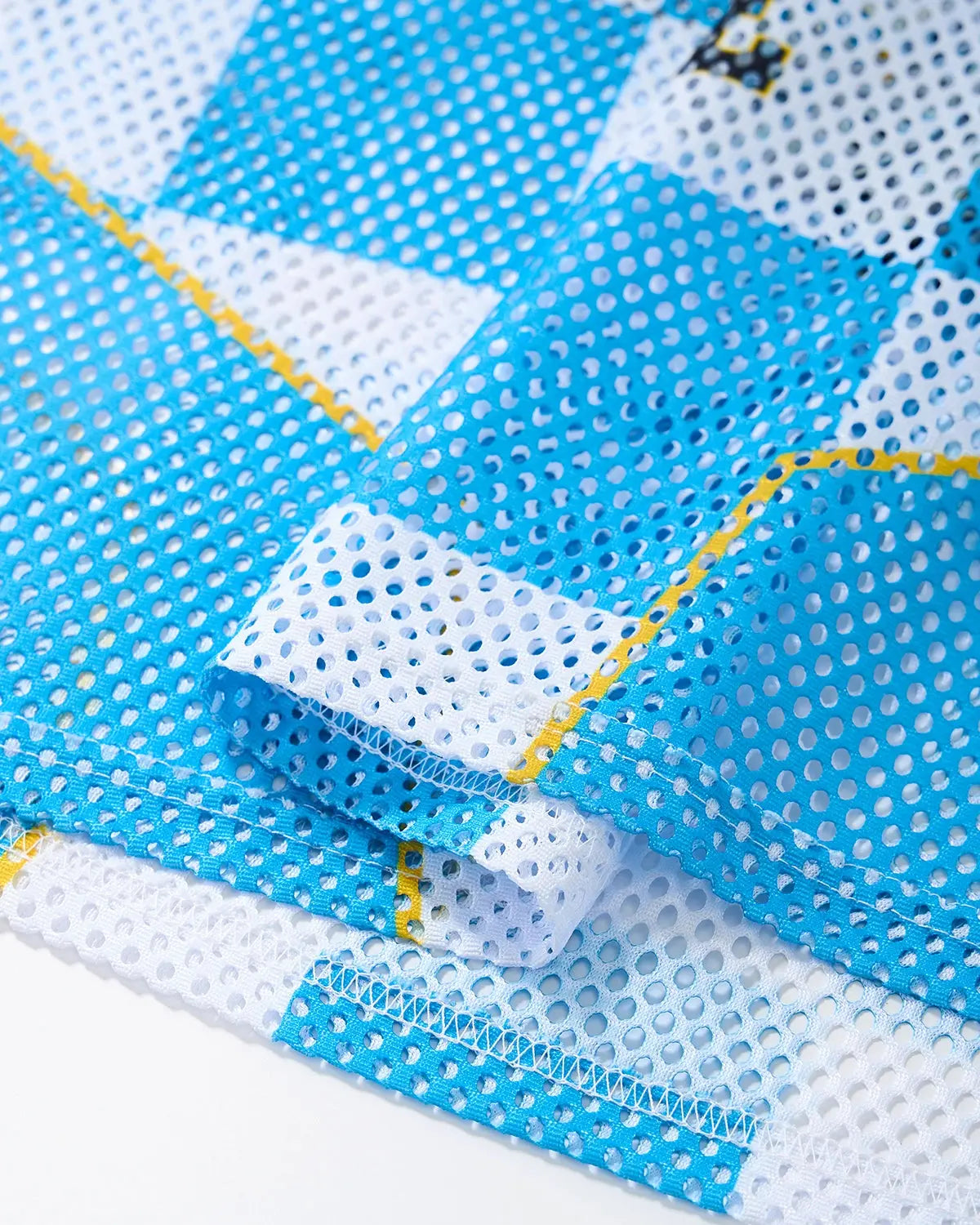 Varsity Checkerboard Mesh Jersey by Flation Streetwear, featuring bold black and white checkerboard pattern and athletic mesh fabric.