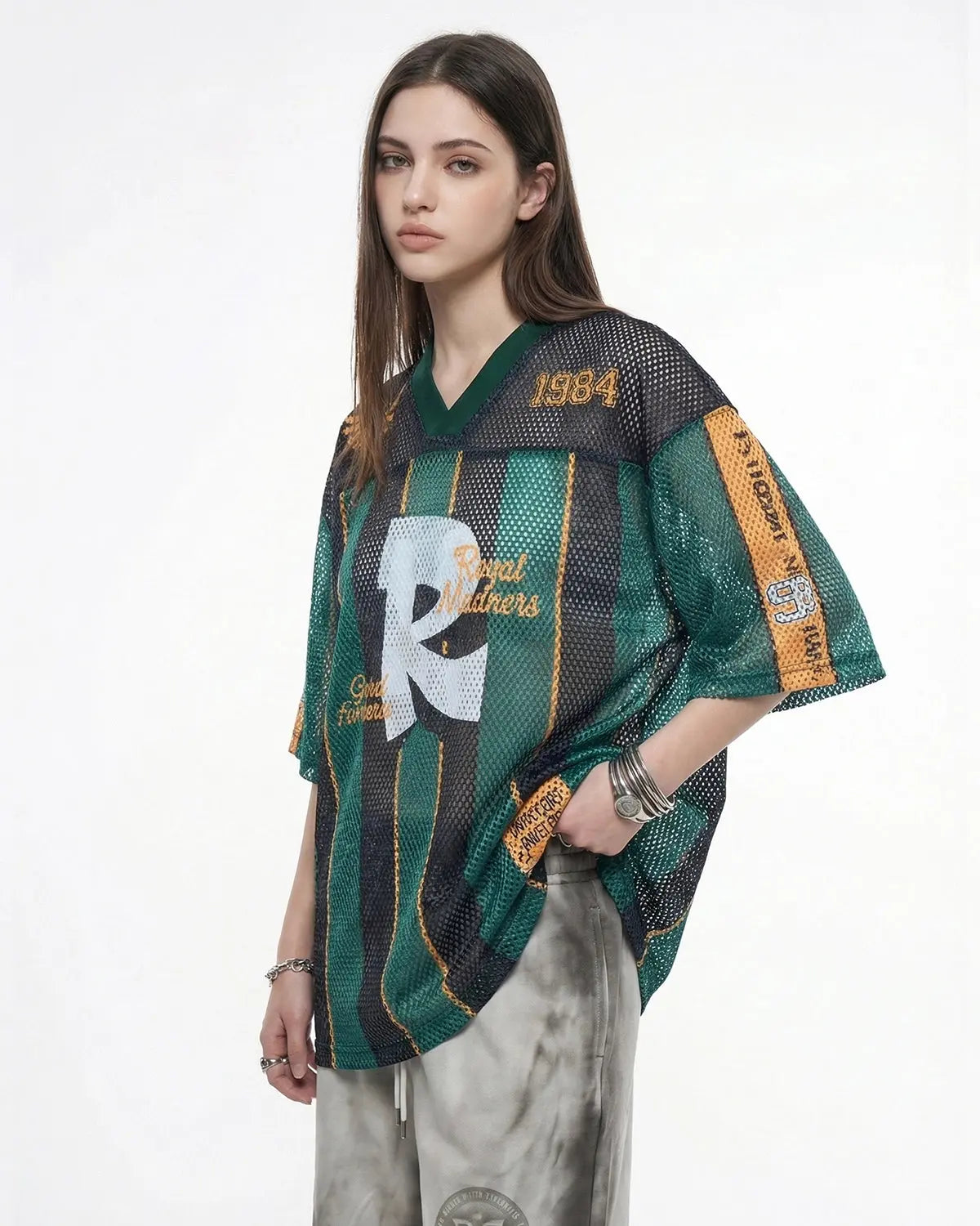 Vintage striped mesh jersey by Flation Streetwear, featuring colorful horizontal stripes and lightweight breathable fabric.