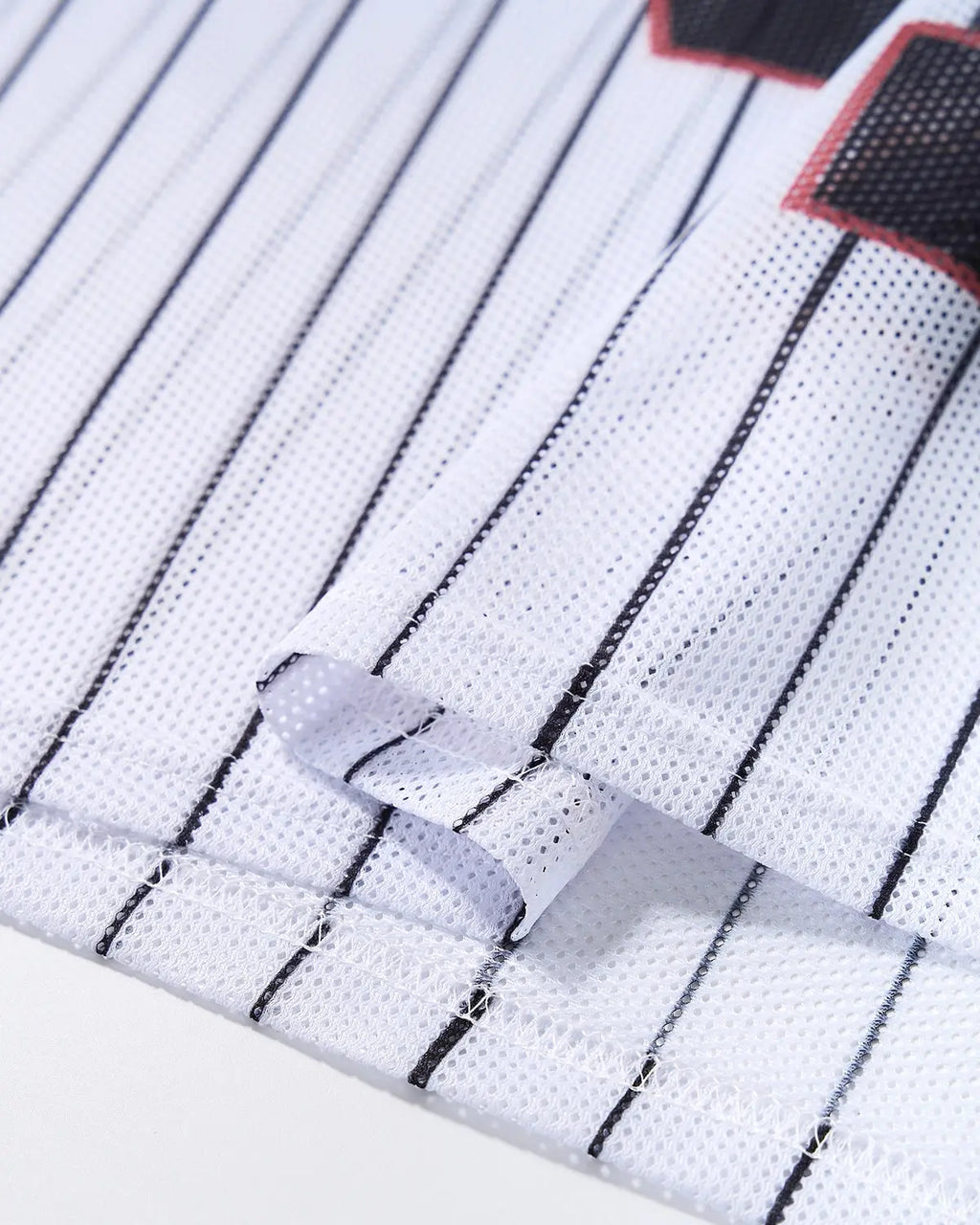 Flation Pinstripe Number Mesh Jersey featuring breathable mesh fabric and bold number design for streetwear style.