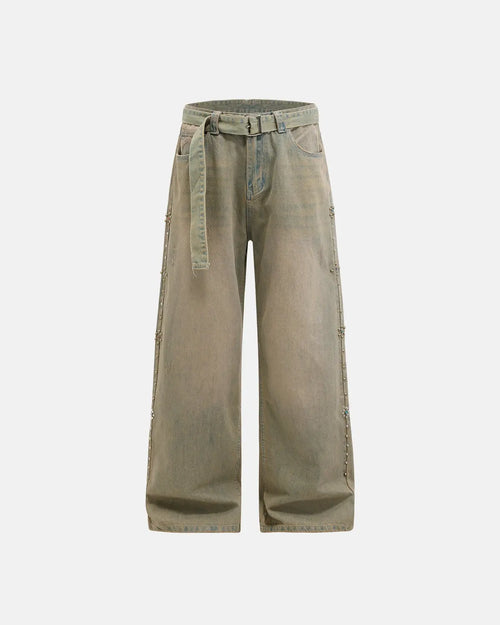 Beaded studded washed baggy jeans by Flation Streetwear featuring distressed denim and decorative bead details, relaxed fit.
