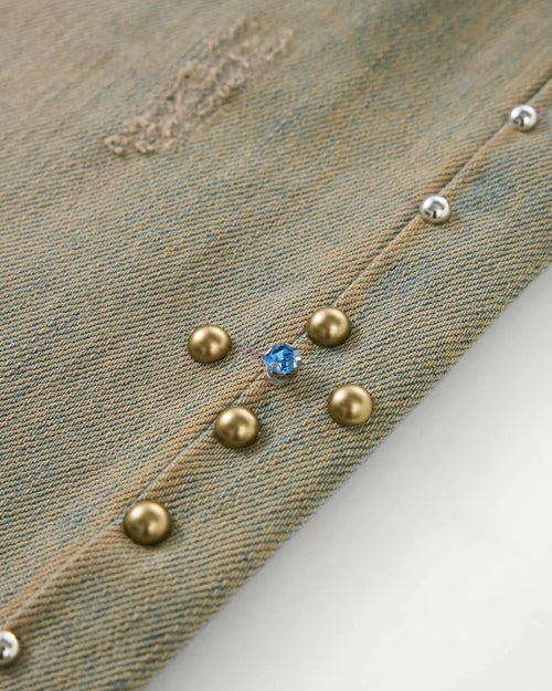 Beaded studded washed baggy jeans by Flation Streetwear featuring distressed denim and decorative bead accents.