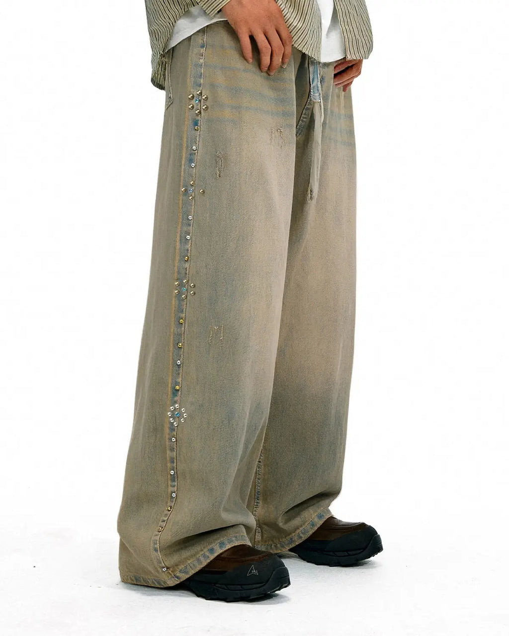 Light blue beaded studded washed baggy jeans by Flation Streetwear with a relaxed fit and distressed details.
