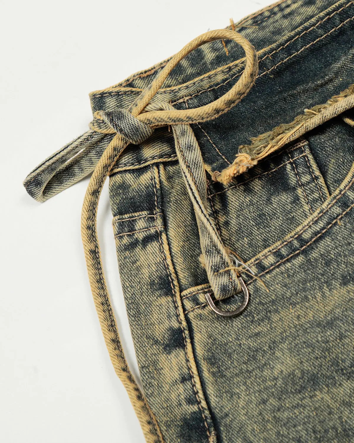 Distressed washed wide-leg denim jeans by Flation Streetwear, shown with frayed edges and relaxed fit for casual style.