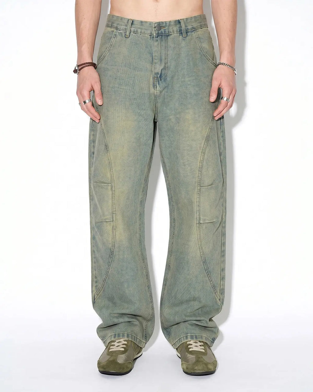 Vintage washed baggy jeans by Flation Streetwear with relaxed fit and distressed details, shown on a model.