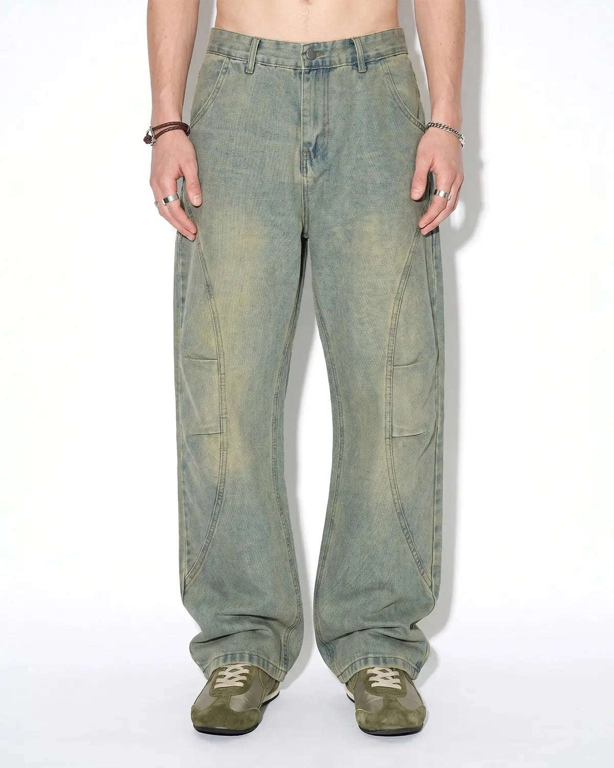 Vintage washed baggy jeans by Flation Streetwear with relaxed fit and distressed details, shown on a model.