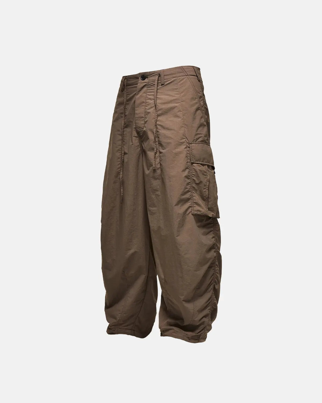 Black Flation Parachute Cargo Pants featuring multiple pockets and a relaxed streetwear style, made by Flation.