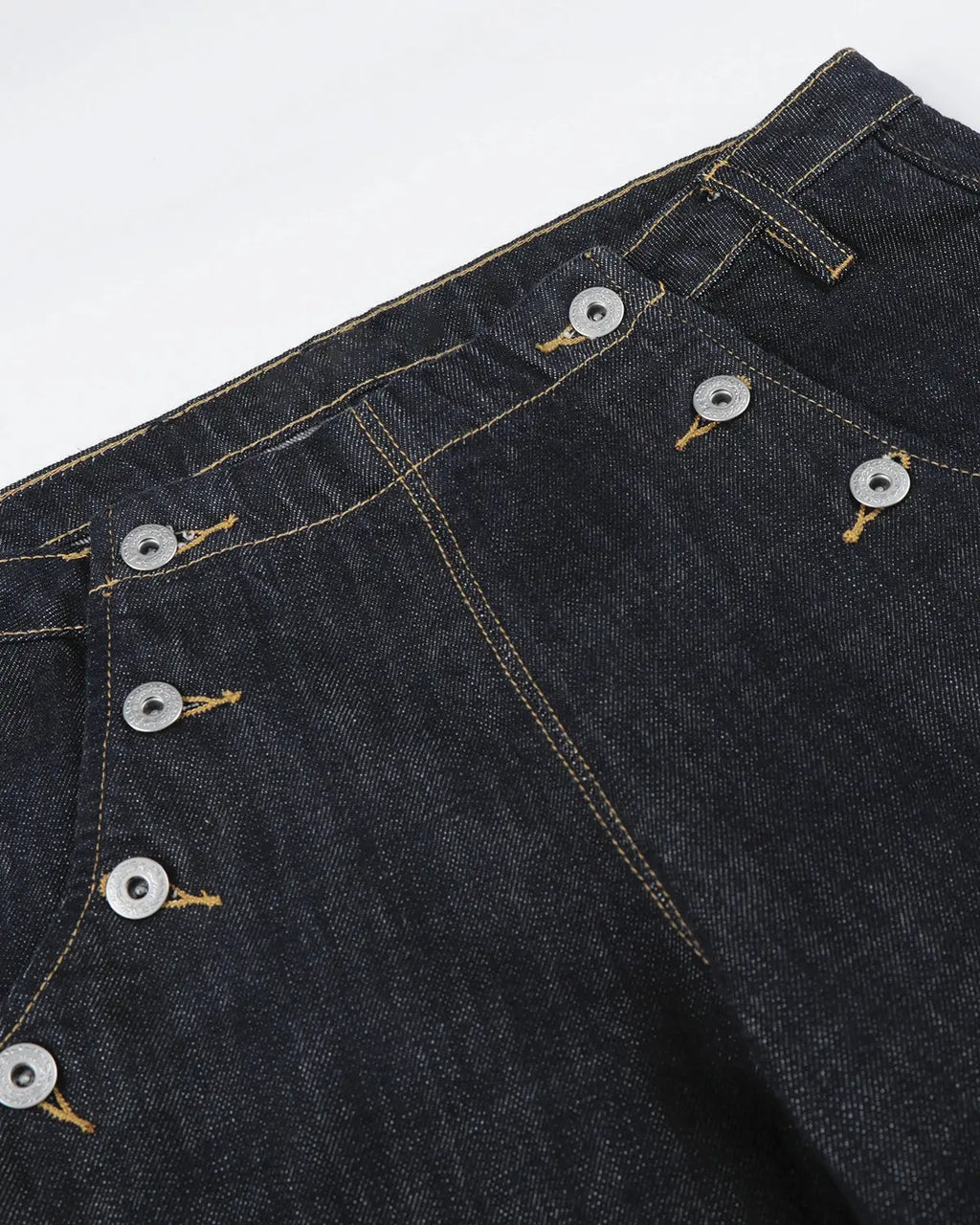 Black and blue raw wide-leg jeans with button details from Flation Streetwear, showcasing a relaxed fit and modern style.