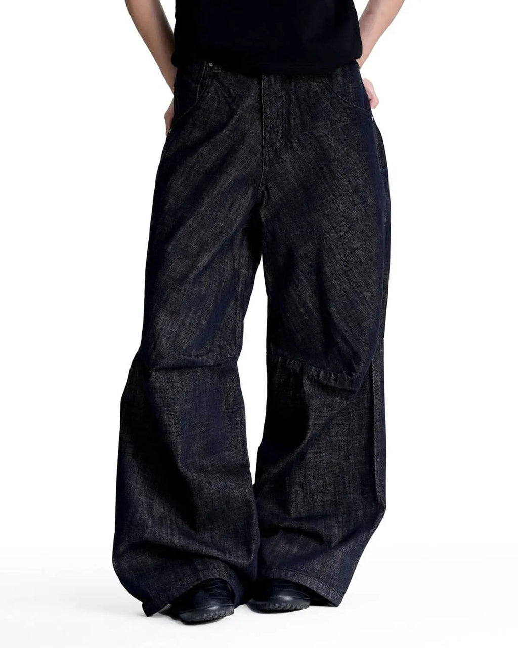 Black and blue Cinch Back Raw Baggy Jeans by Flation Streetwear, featuring a relaxed fit and raw hem details.