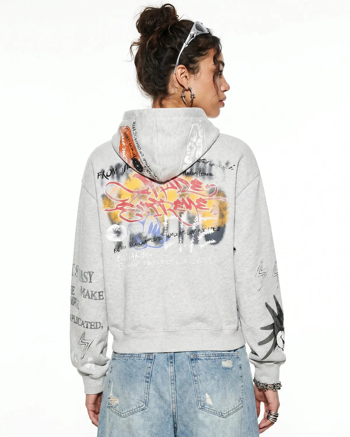 Black boxy graffiti zip-up hoodie by Flation Streetwear, front view showing bold graffiti design and comfortable fit