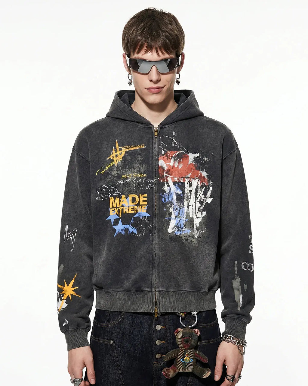 Black boxy graffiti zip-up hoodie by Flation Streetwear featuring bold street art design and comfortable fit.