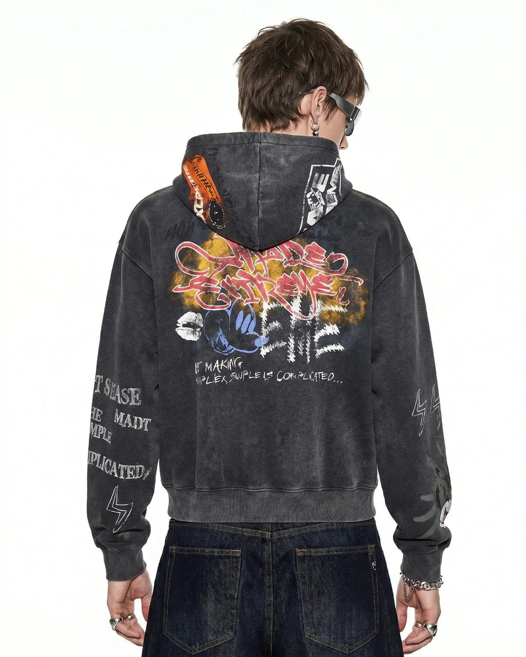 Black boxy graffiti zip-up hoodie by Flation Streetwear, featuring bold graffiti artwork and a relaxed fit.
