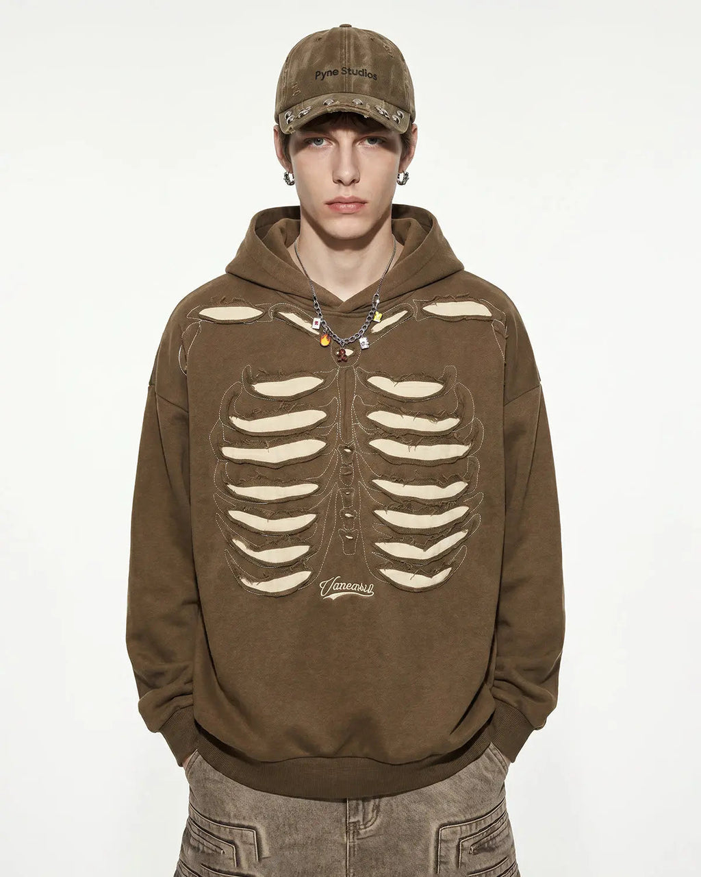 Black distressed ribcage wash hoodie from Flation Streetwear, featuring a relaxed fit and casual streetwear style.