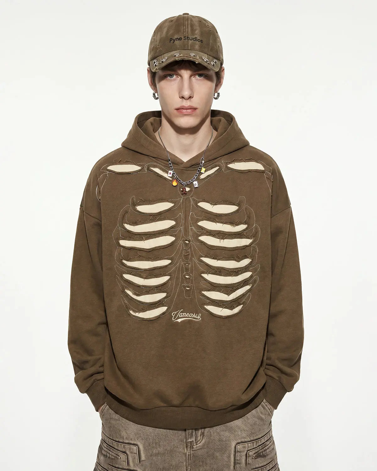Black distressed ribcage wash hoodie from Flation Streetwear, featuring a relaxed fit and casual streetwear style.