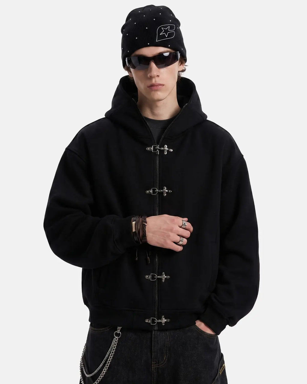 Black metal clasp boxy zip-up hoodie by Flation, featuring a modern streetwear style with a relaxed fit and designer details.