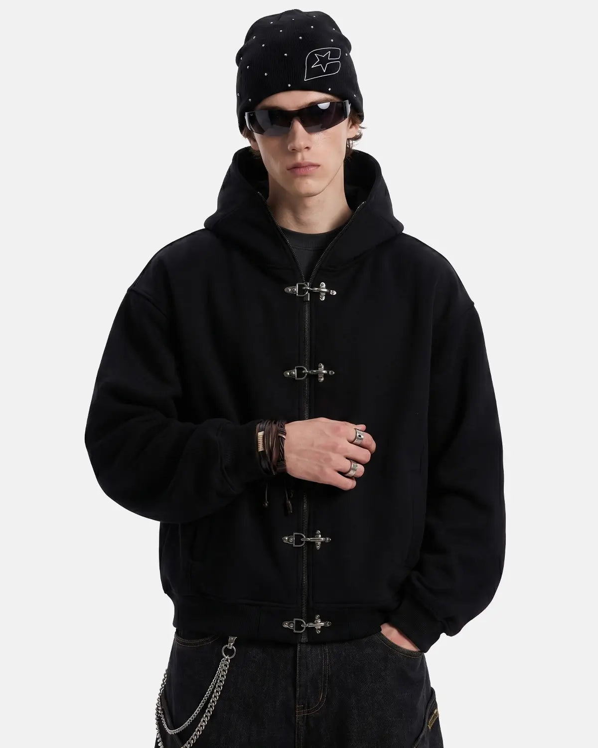 Black metal clasp boxy zip-up hoodie by Flation, featuring a modern streetwear style with a relaxed fit and designer details.