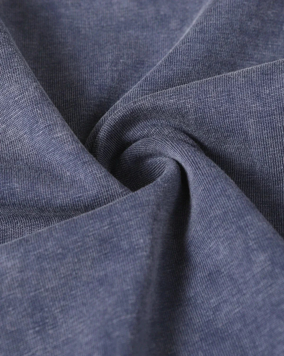 Patchwork washed boxy cropped T-shirt by Flation with colorful denim patchwork and relaxed streetwear style.