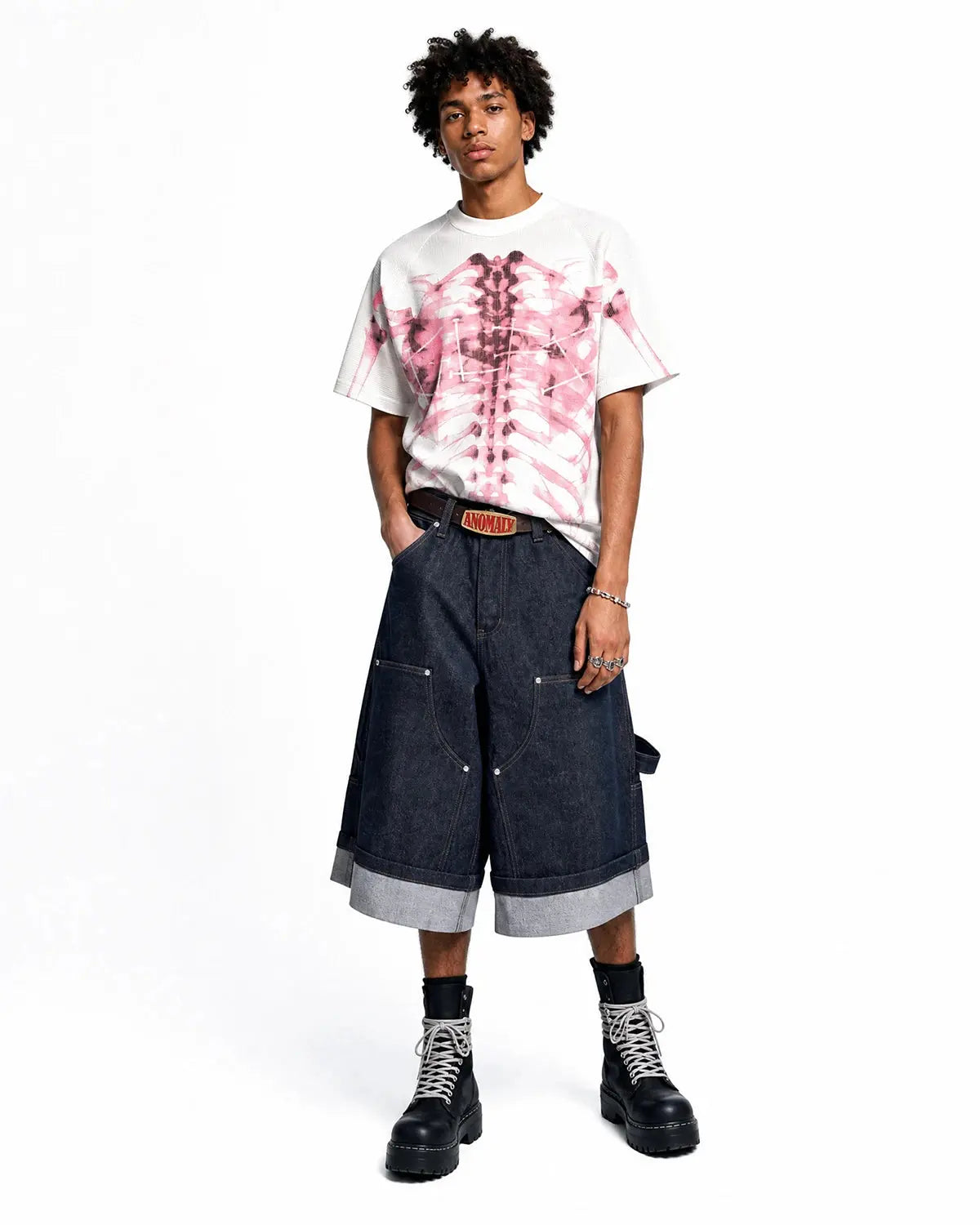 Pink X-ray skeleton boxy T-shirt from Flation streetwear featuring a bold skeletal graphic on the front.