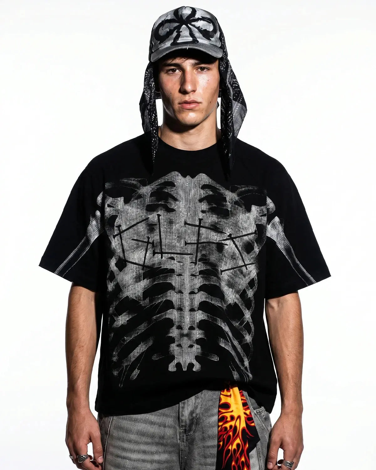 Pink X-ray skeleton boxy T-shirt by Flation featuring a bold skeletal design on soft cotton fabric.