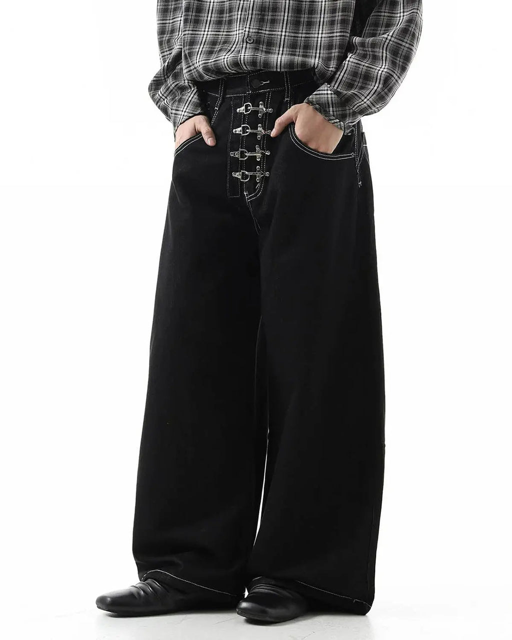 Raw metal clasp baggy jeans from Flation Streetwear featuring a relaxed fit and distressed denim style.