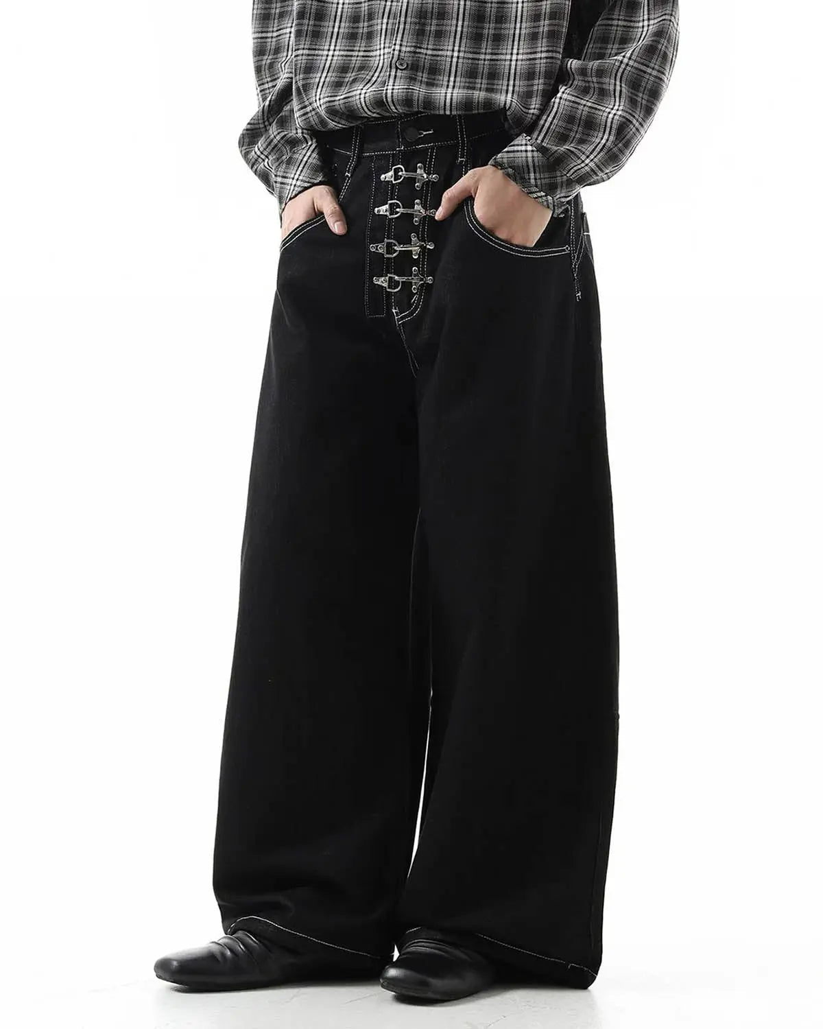 Raw metal clasp baggy jeans from Flation Streetwear featuring a relaxed fit and distressed denim style.