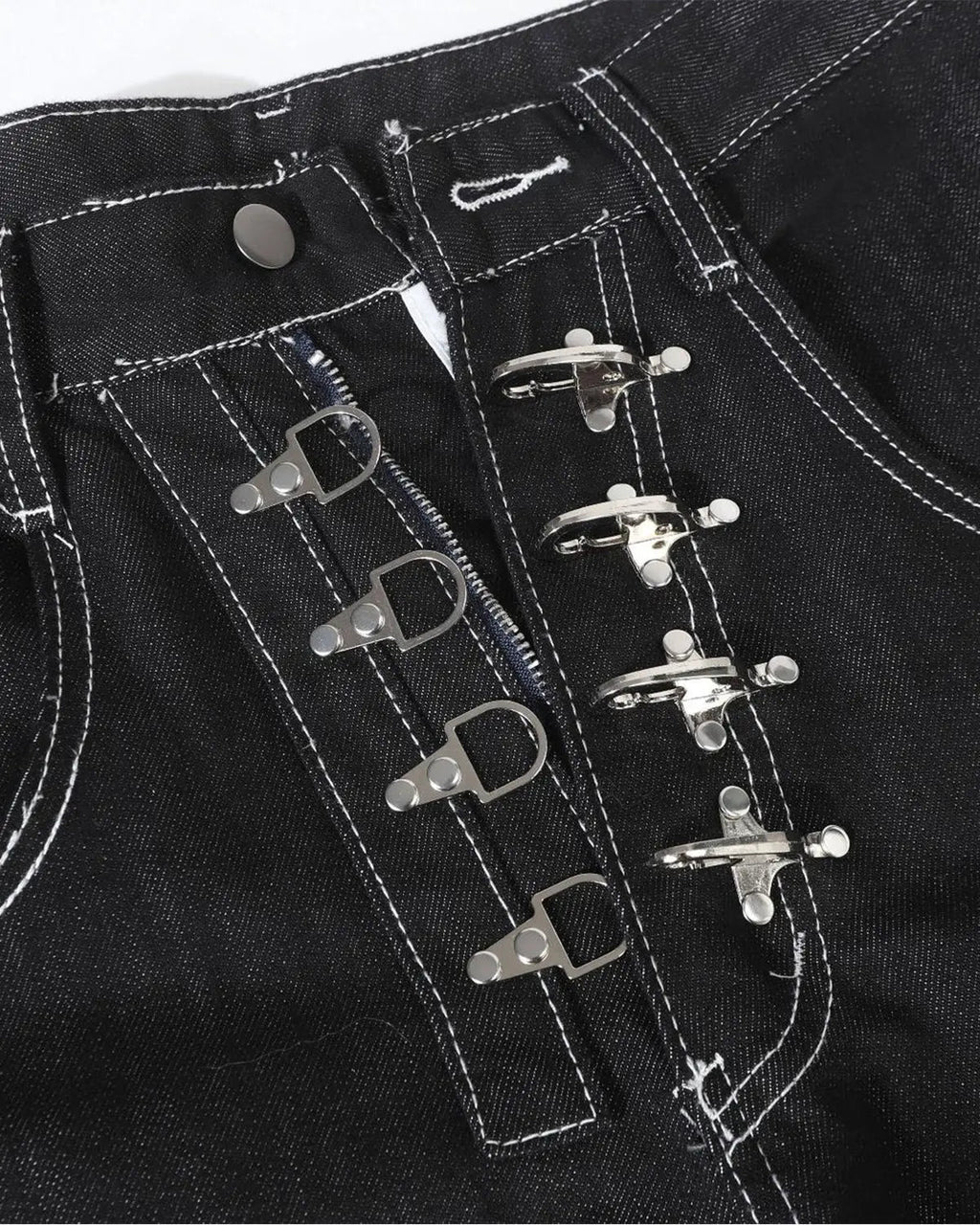 Raw metal clasp baggy jeans by Flation Streetwear featuring a loose fit and distressed denim style.
