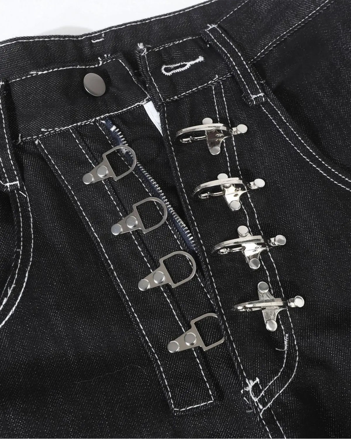 Raw metal clasp baggy jeans by Flation Streetwear featuring a loose fit and distressed denim style.