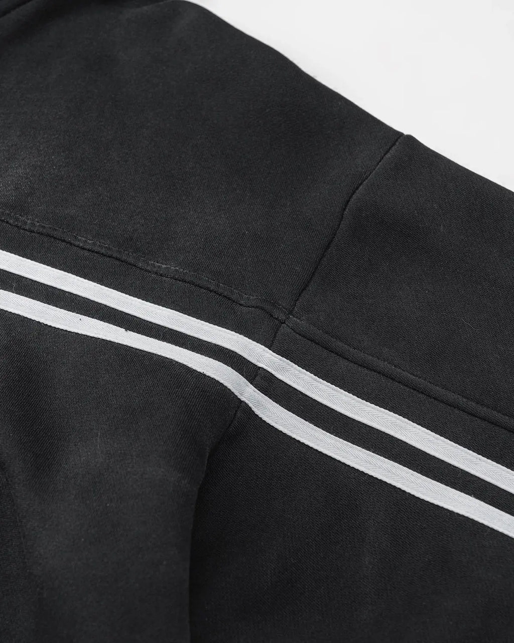 Black striped acid wash zip-up hoodie by Flation Streetwear, featuring a casual fit and front zipper detail.