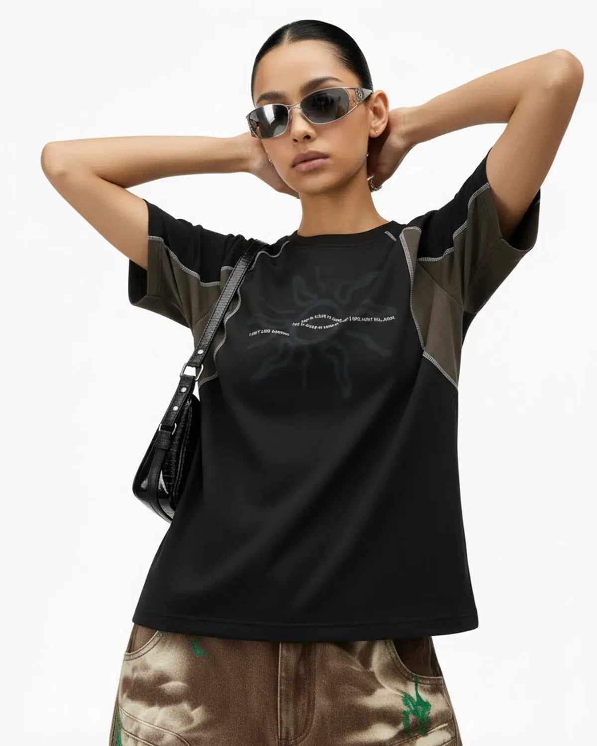 Black Flation Totem Graphic Patchwork T-shirt featuring bold patchwork design and streetwear style.