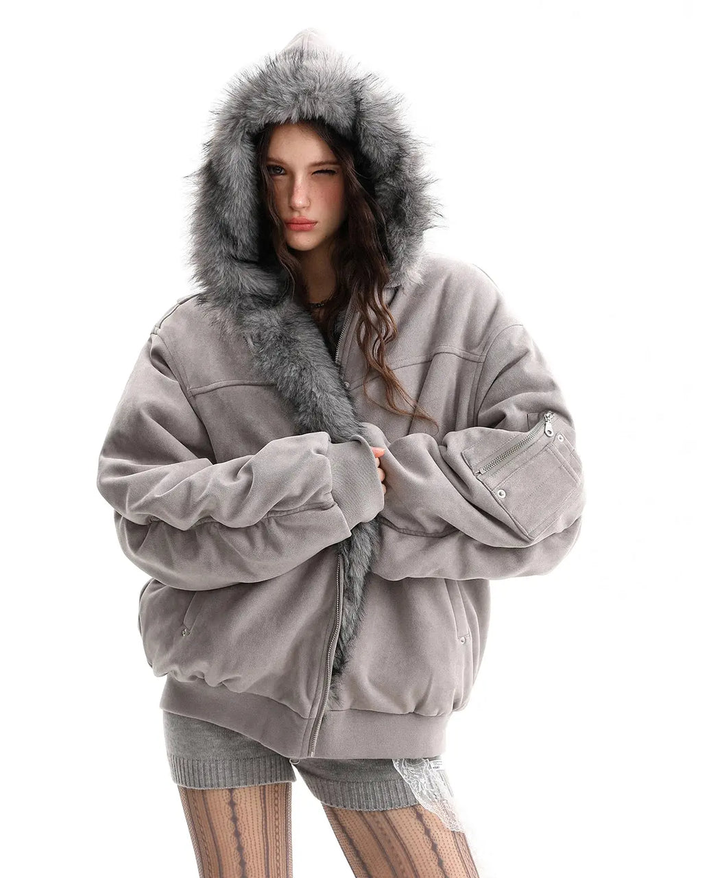 Reversible faux fur hooded jacket by Flation Streetwear shown with plush fur exterior and casual design, front view.