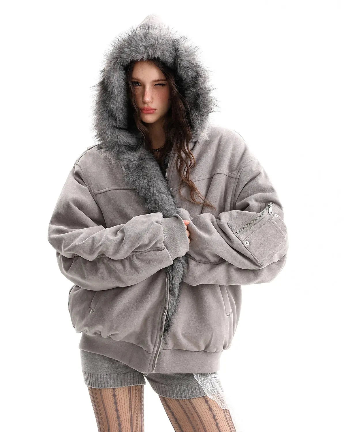 Reversible faux fur hooded jacket by Flation Streetwear shown with plush fur exterior and casual design, front view.