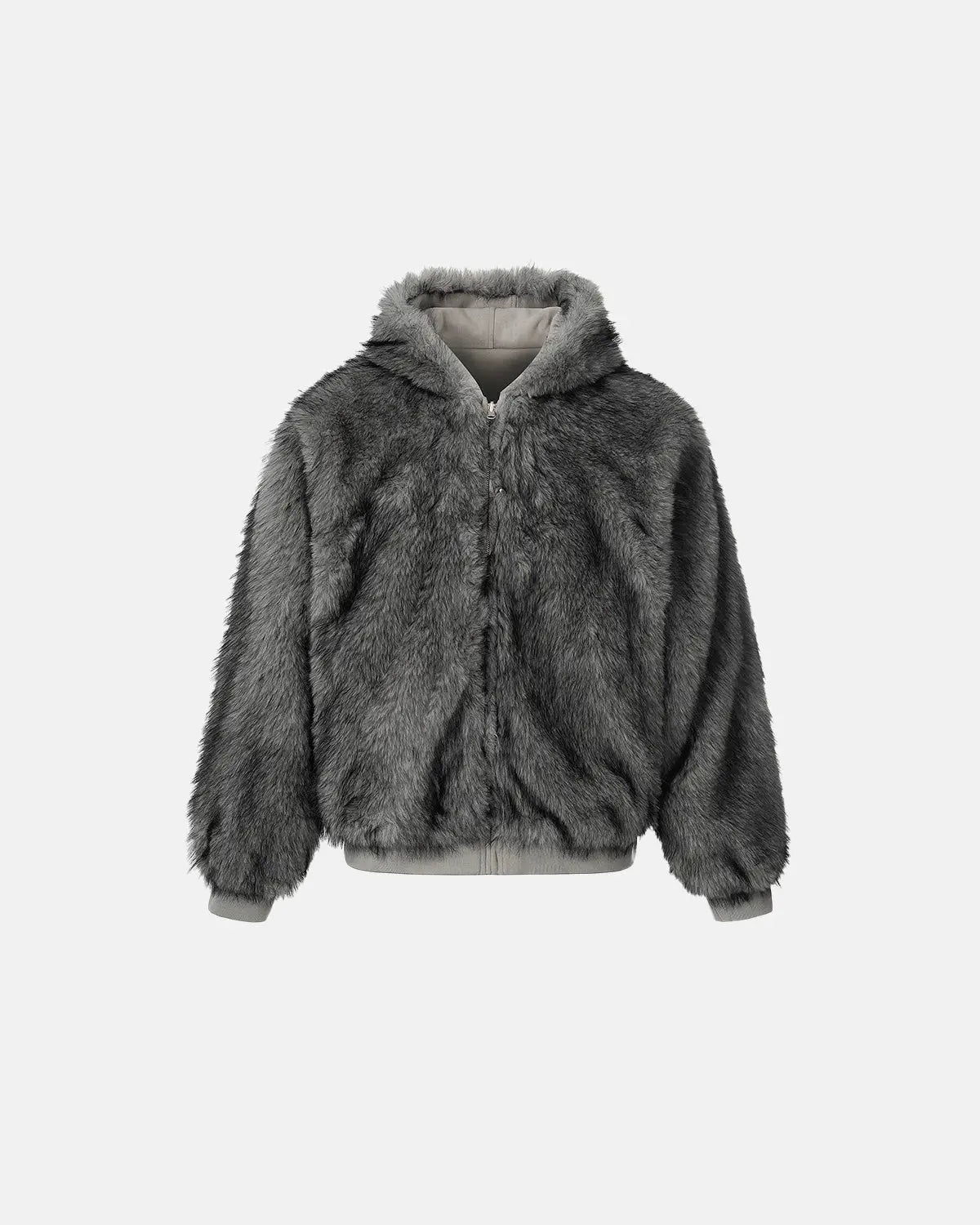 Reversible faux fur hooded jacket by Flation, showing both the plush faux fur interior and sleek outer design.