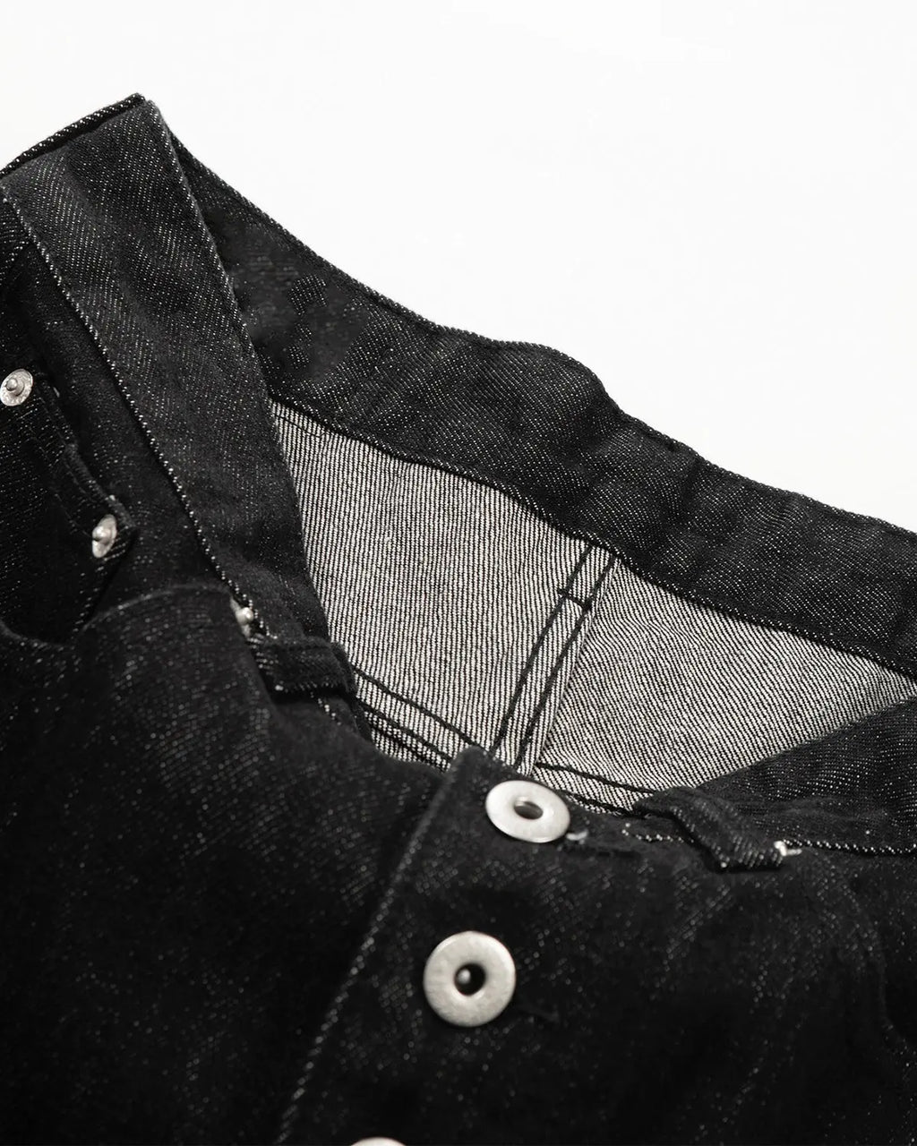 Raw Buttons Up Baggy Jeans by Flation featuring a relaxed fit, distressed denim, and button details in a streetwear style.