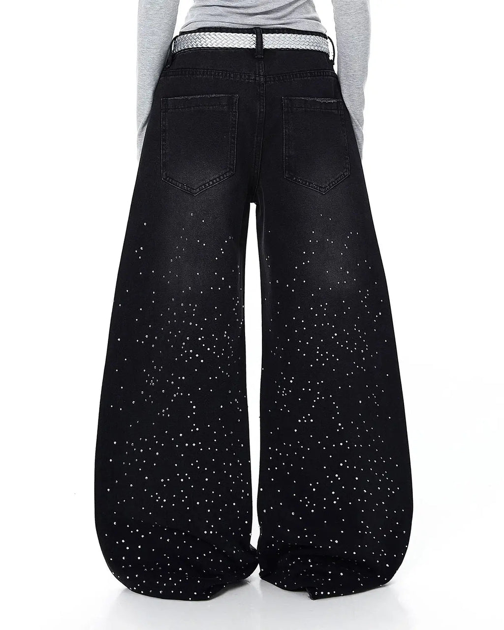 Black acid wash rhinestone baggy jeans by Flation Streetwear featuring a relaxed fit and sparkling rhinestone details.