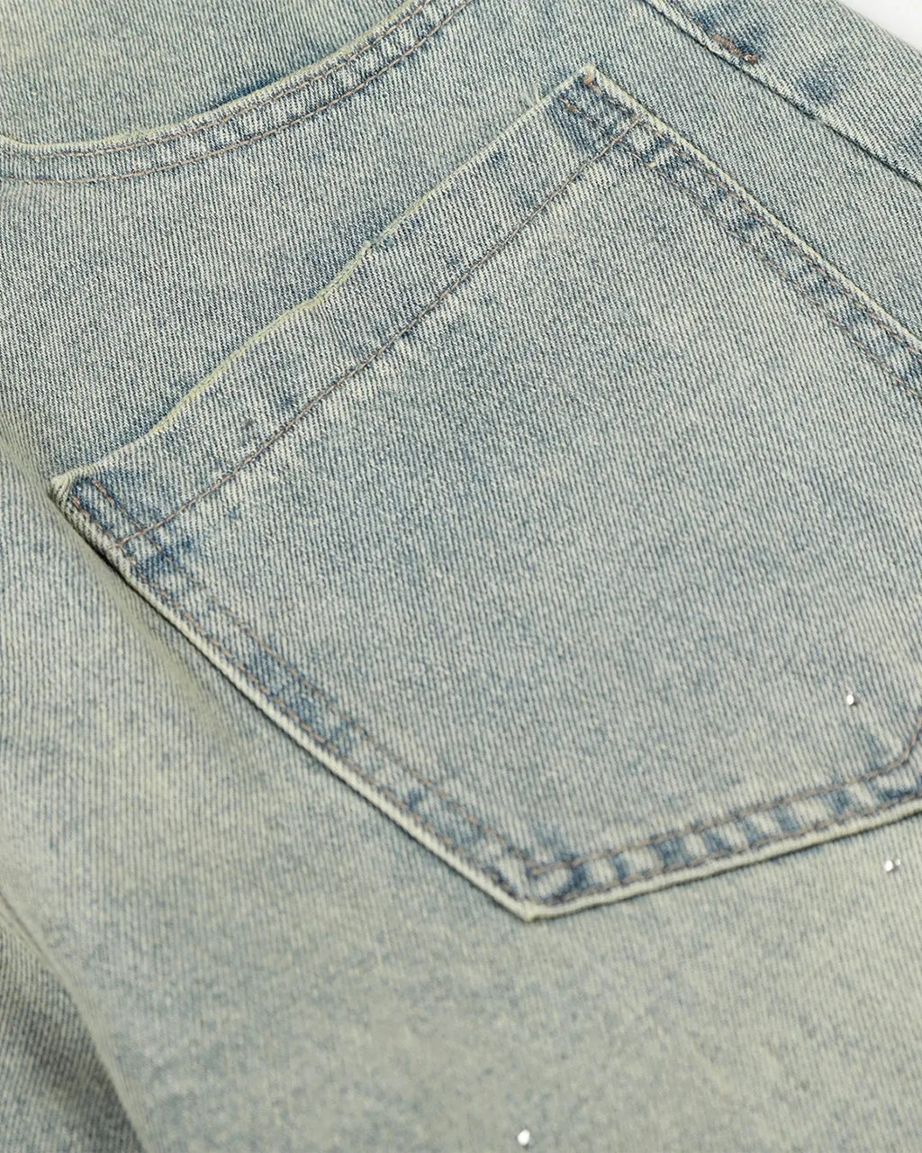 Black acid wash rhinestone baggy jeans by Flation Streetwear, featuring a relaxed fit and sparkling rhinestone embellishments.