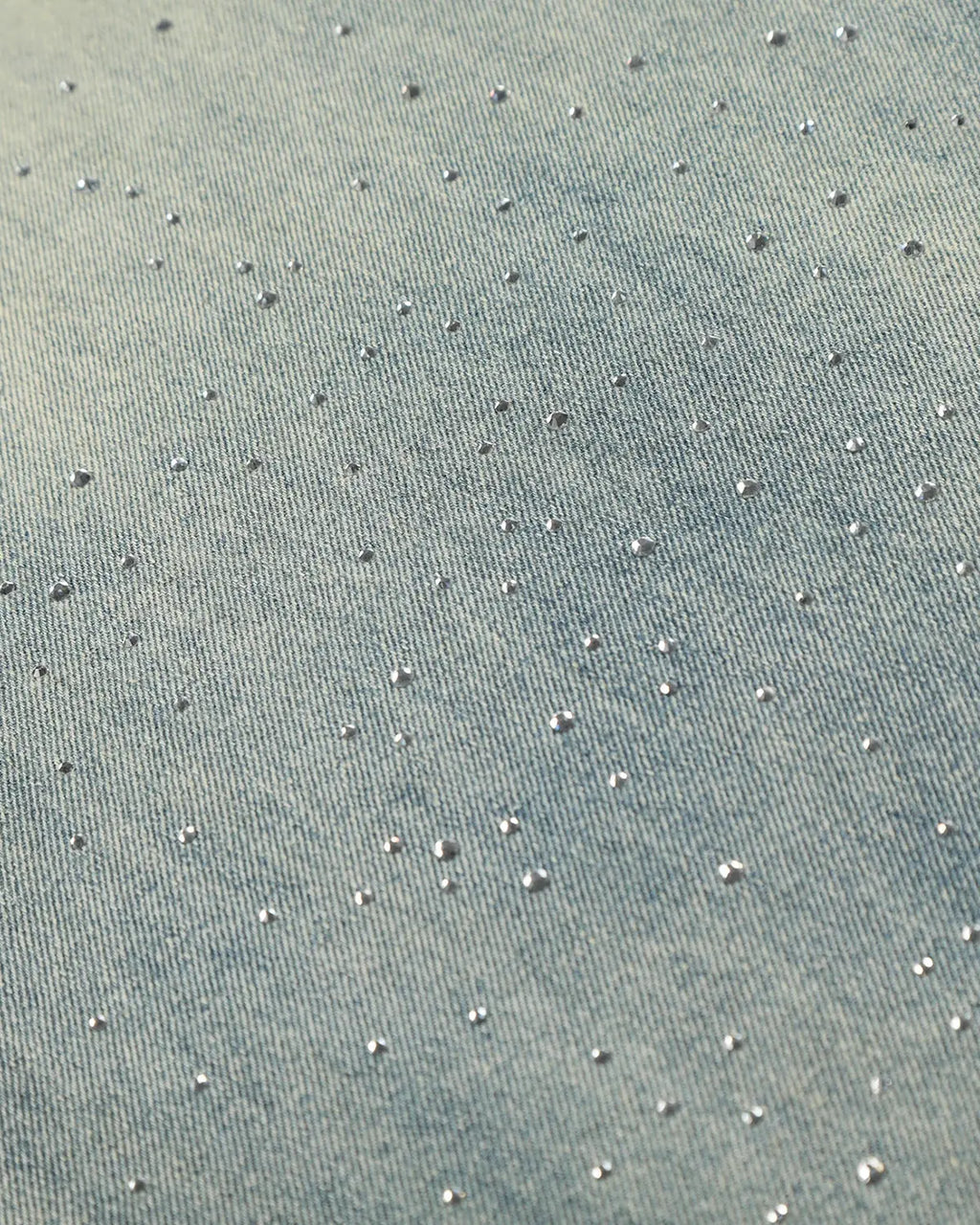 Black acid wash rhinestone baggy jeans by Flation Streetwear, featuring a loose fit and sparkling rhinestone accents.