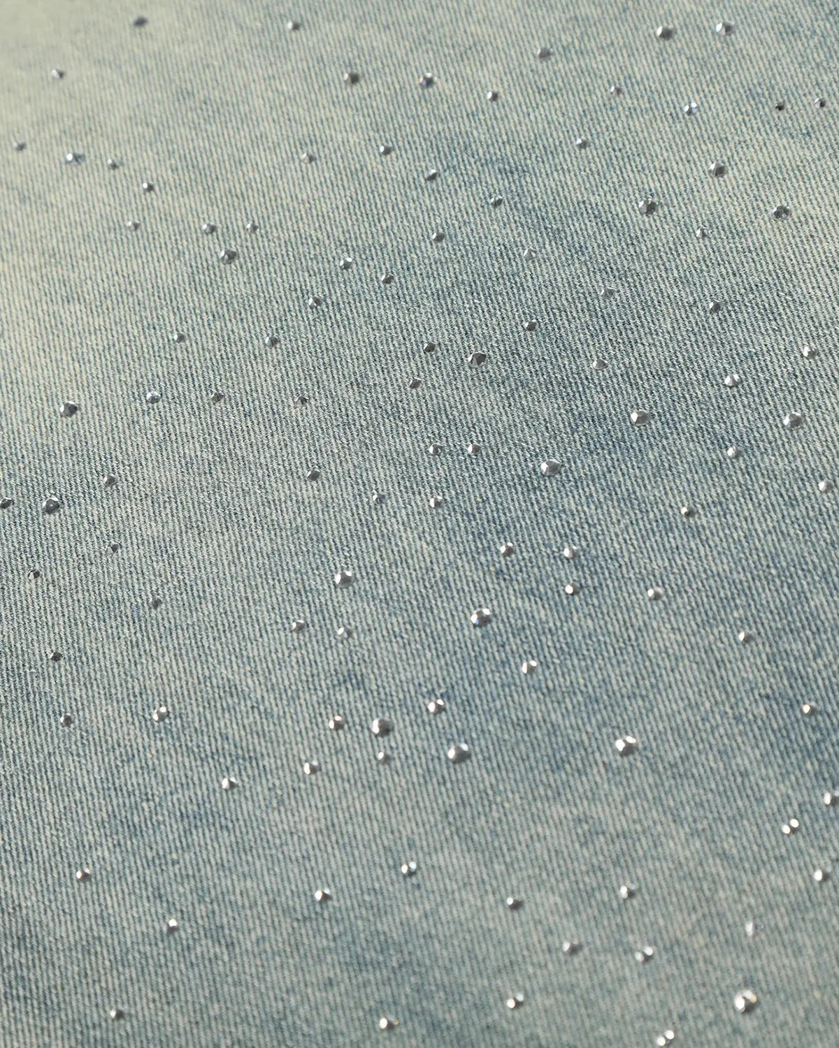 Black acid wash rhinestone baggy jeans by Flation Streetwear, featuring a loose fit and sparkling rhinestone accents.