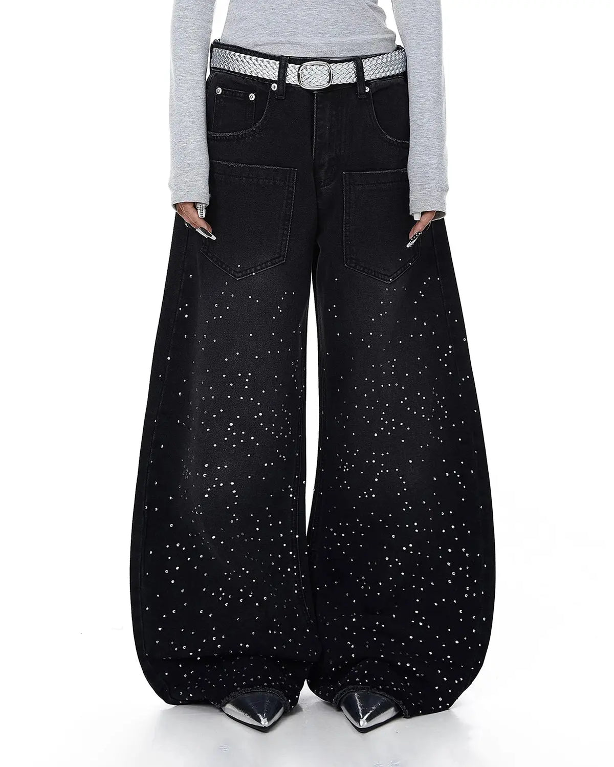 Black acid wash rhinestone baggy jeans from Flation Streetwear with loose fit and sparkling rhinestone details.