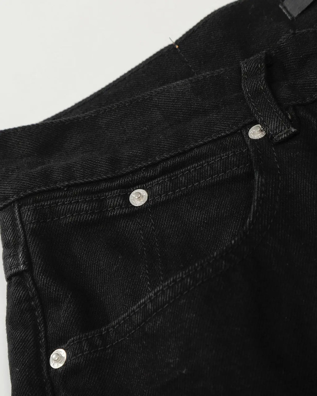 Black baggy jeans by Flation Streetwear with relaxed fit, featuring a casual style and visible stitching detail.