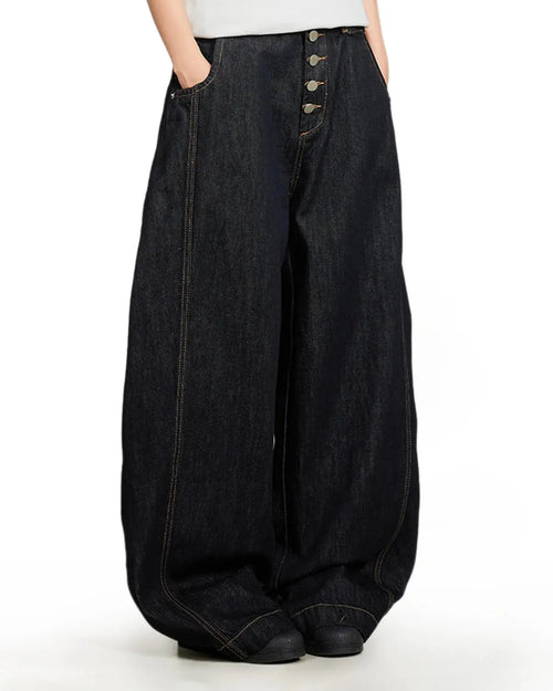Black buttons-up barrel baggy jeans by Flation Streetwear, featuring a relaxed fit and classic denim style.